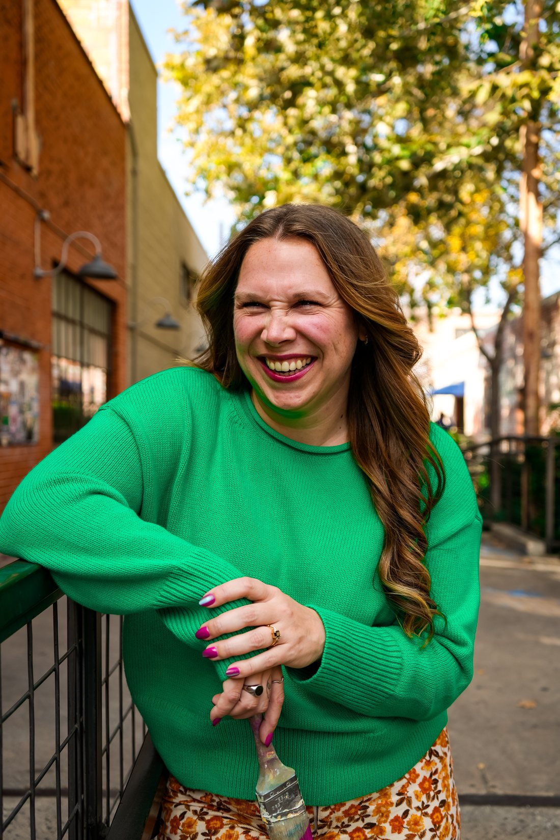Jess, co-owner and lead mural artist of M. Lynn Creative